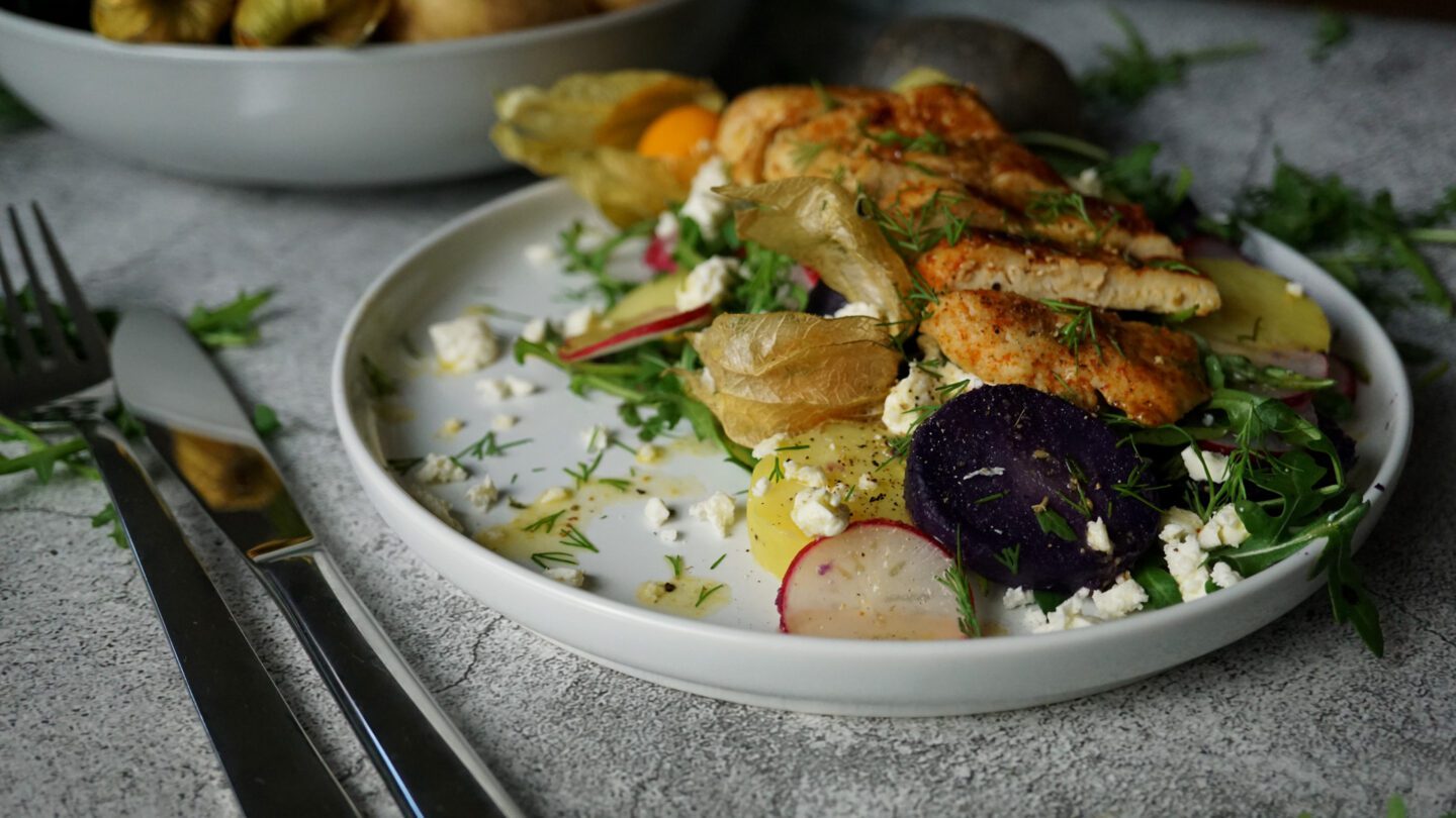 Hähnchen mit Kartoffel-Rucola-Salat und Orangen-Dressing